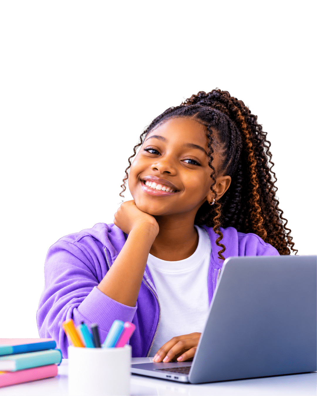 Smiling student holding a laptop, ready to learn and create
